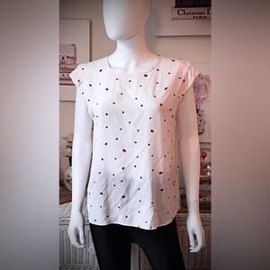 Joie short sleeve blouse with lady bug print on pale pink background size medium